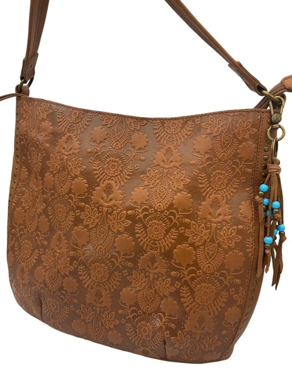 The Sak Leather Hobo Indio Floral Tooled Slouchy Tan Shoulder Bag Tassel Charm